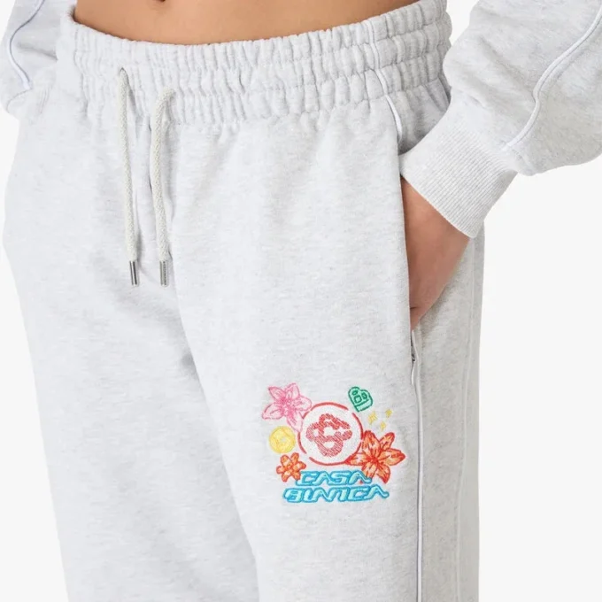 Graue, bestickte, verkürzte Jogginghose