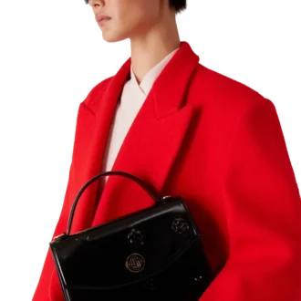 Jeanne-Tasche mit schwarzen Emblemen